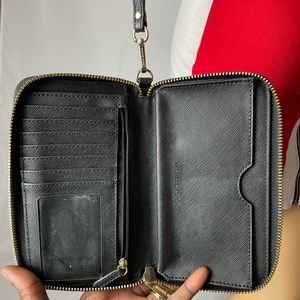 Black Micheal Kors wristlet wallet with Gold studs